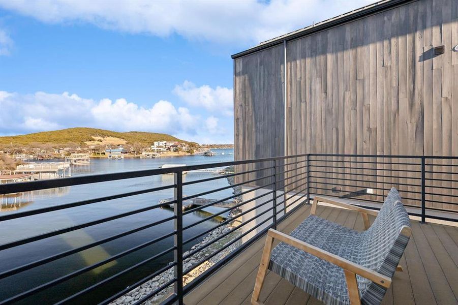 Exterior details and patio area of a home in , Graford (Image 4).