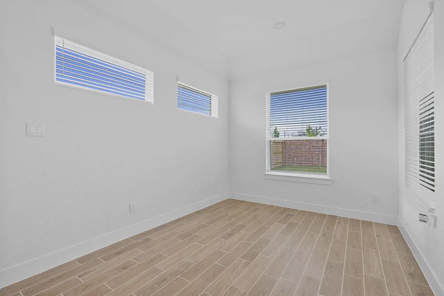 Representative unfurnished interior of a home built from the Brooks by Chesmar Homes in Grange, Katy (Image 19).