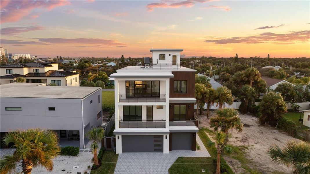 Front exterior of a new home in , New Smyrna Beach, FL, highlighting curb appeal (Image 38).