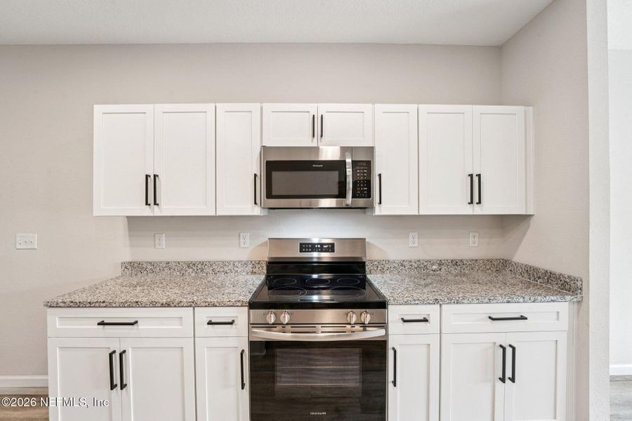Furnished interior view inside a new home in , Jacksonville (Image 17).