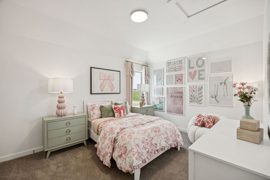 Bedroom in the Trinity home plan by Trophy Signature Homes – REPRESENTATIVE PHOTO