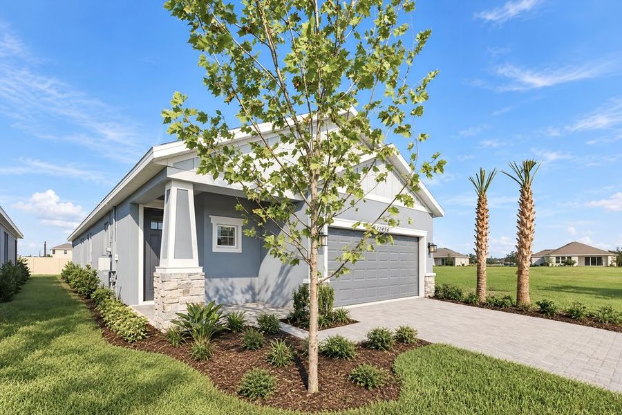 Front exterior of a new home in Lochside, Mount Dora, FL, highlighting curb appeal (Image 29).