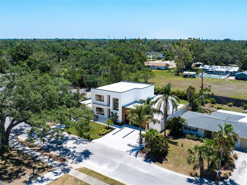 Front exterior of a new home in , Sarasota, FL, highlighting curb appeal (Image 27).