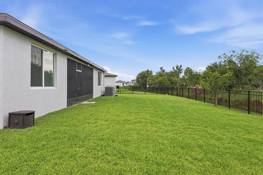 Exterior details and patio area of a home in , Parrish (Image 24).