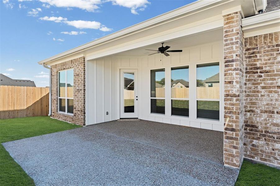 View of patio / terrace with a ceiling fan View of patio / terrace with a ceiling fan