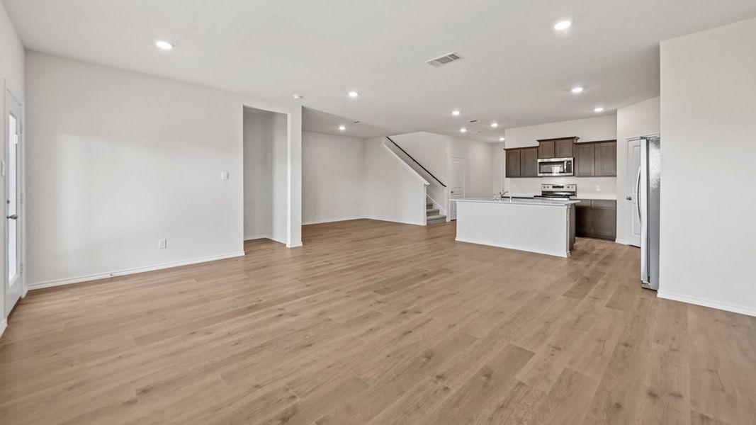 Representative unfurnished interior of a home built from the Oak Leaf by D.R. Horton in Enclave at Kings Fort, Kaufman (Image 9).