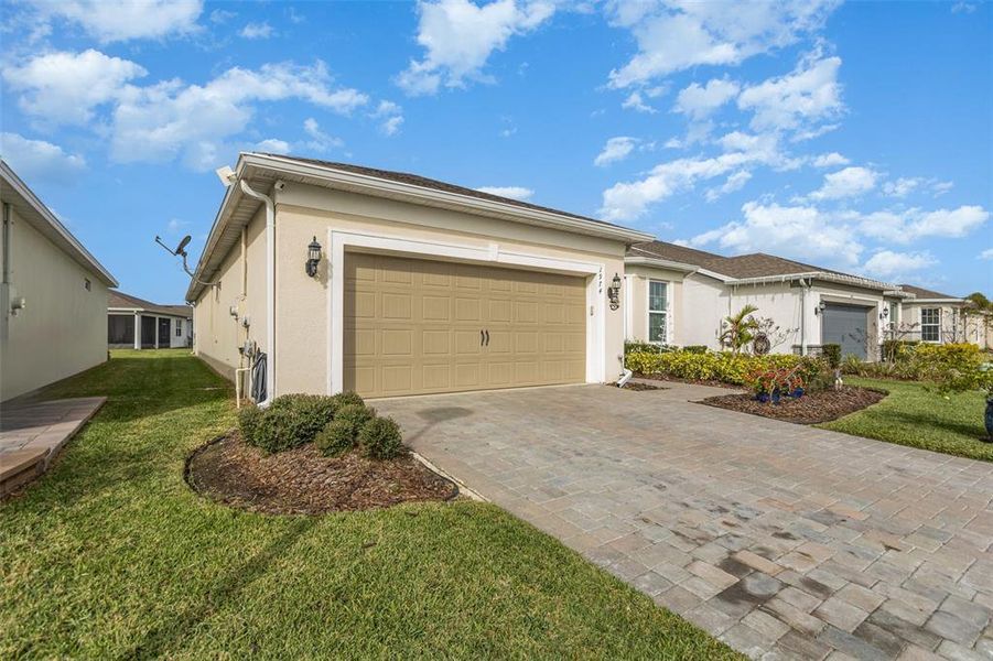 Exterior details and patio area of a home in Tohoqua Reserve, Kissimmee (Image 23).