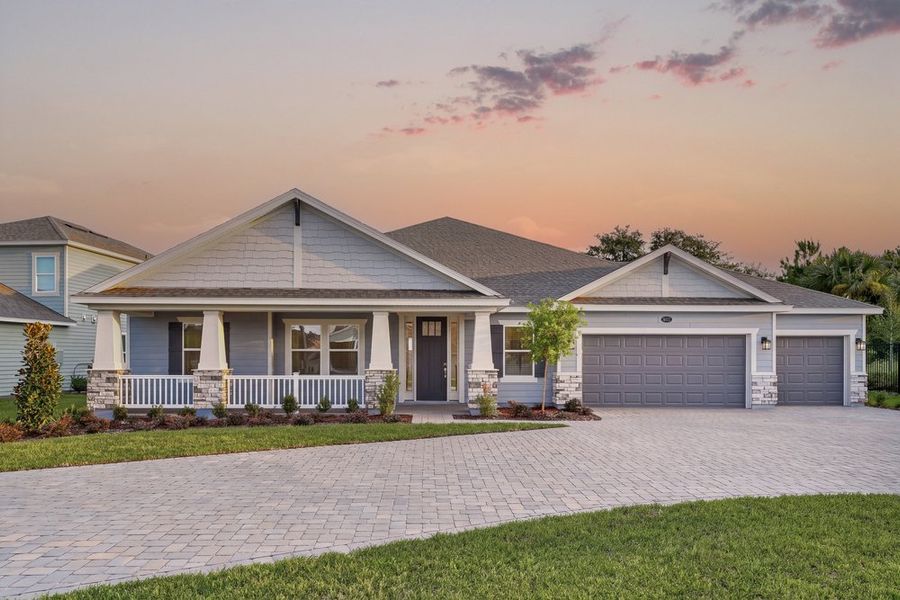 Front exterior of a new home in Headwaters at Lofton Creek, Yulee, FL, highlighting curb appeal (Image 22).