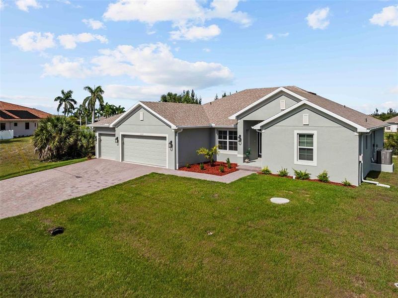 Front exterior of a new home in Port Charlotte, Port Charlotte, FL, highlighting curb appeal (Image 26).