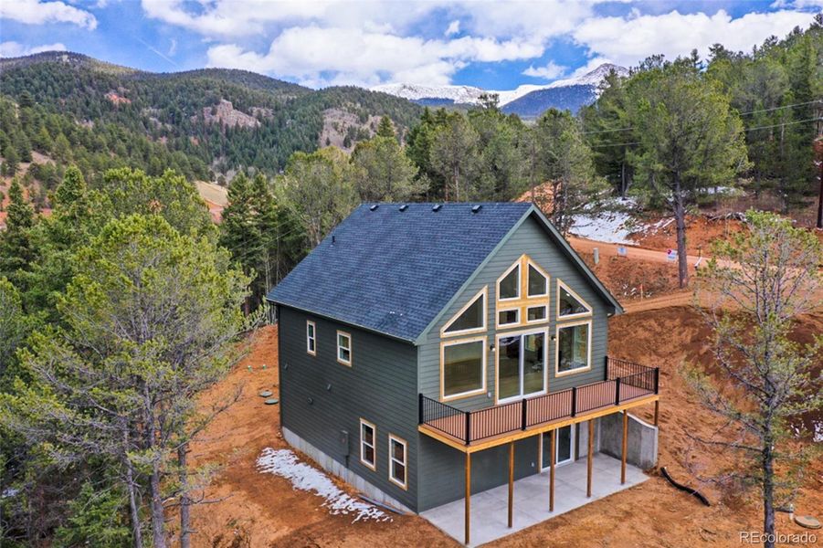 Front exterior of a new home in , Divide, CO, highlighting curb appeal (Image 26). Front exterior of a new home in , Divide, CO, highlighting curb appeal (Image 26).