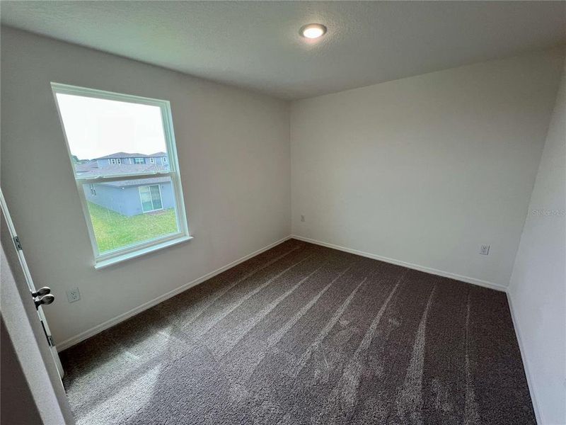 Spacious, unfurnished interior of a new home in Villamar, Winter Haven (Image 26).