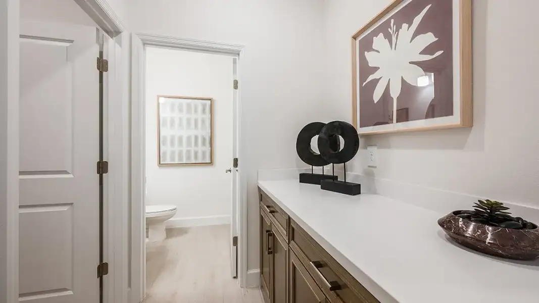 Representative furnished interior of a home built from the Bainbridge by Taylor Morrison in Azure at Solaeris, Port St. Lucie (Image 26).