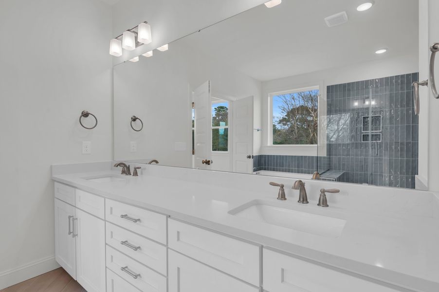 Representative furnished interior of a home built from the The Hampton by RobuckHomes in Windwater, Hampstead (Image 17).