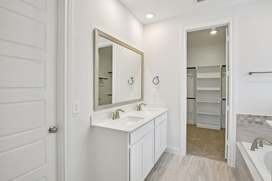 Furnished interior view inside a new home in Pine Lake Cove - Classic Series, Montgomery (Image 7).