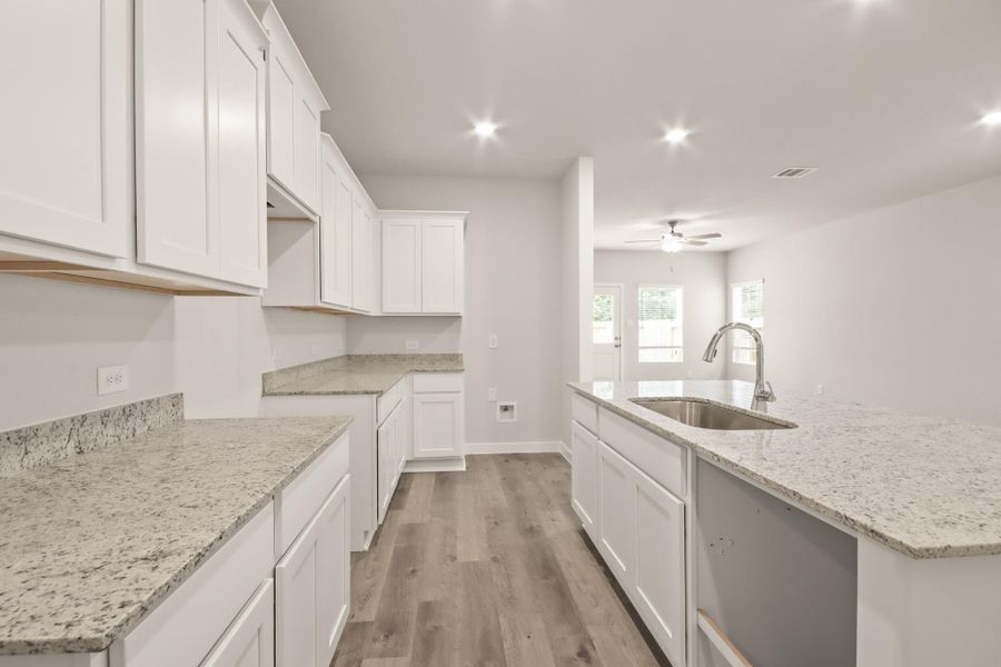 Furnished interior view inside a new home in Lonestar Collection at Granger Pines, Conroe (Image 8). Furnished interior view inside a new home in Lonestar Collection at Granger Pines, Conroe (Image 8).