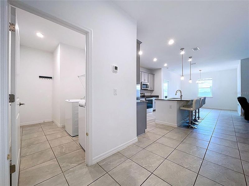 Furnished interior view inside a new home in Covered Bridge at Liberty Bluff, Haines City (Image 7).