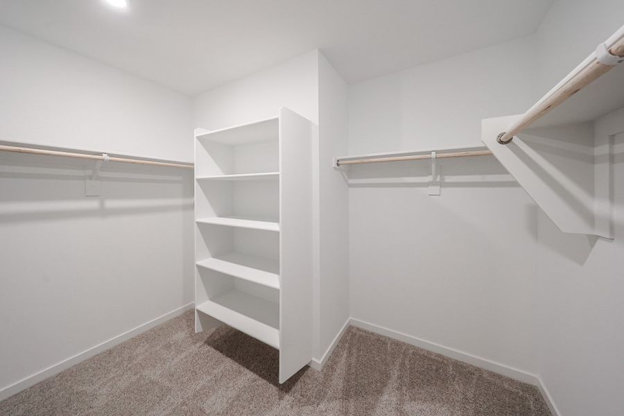 A white staircase in a room.