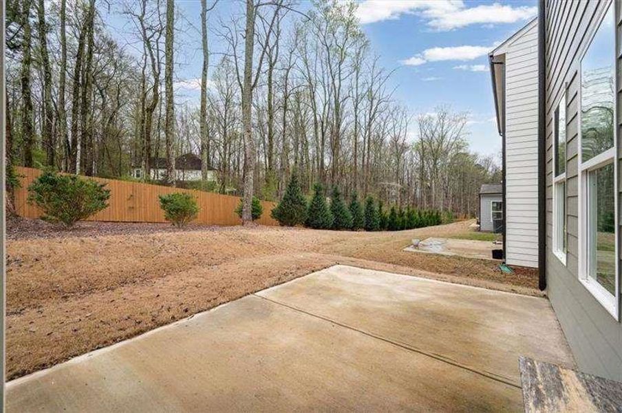 Exterior details and patio area of a home in Enclave at Edgewater, Holly Springs (Image 3). Exterior details and patio area of a home in Enclave at Edgewater, Holly Springs (Image 3).