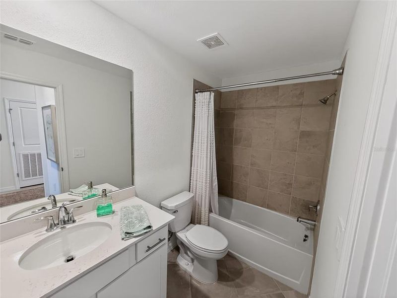 Furnished interior view inside a new home in Wellen Park Golf & Country Club, Venice (Image 11).