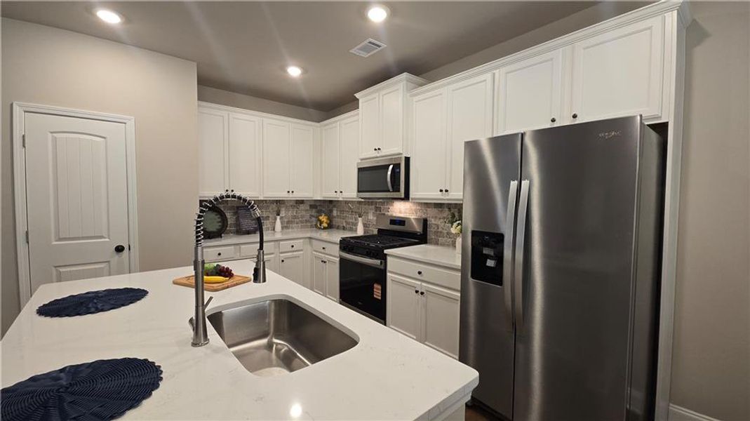 Furnished interior view inside a new home in , Grayson (Image 4).