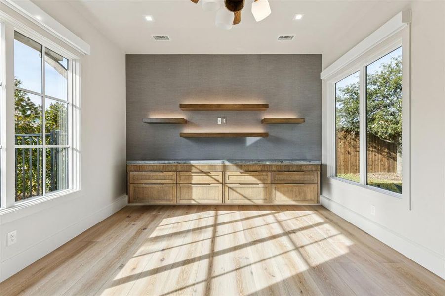 Study for work from home with floating cabinets and shelves Study for work from home with floating cabinets and shelves