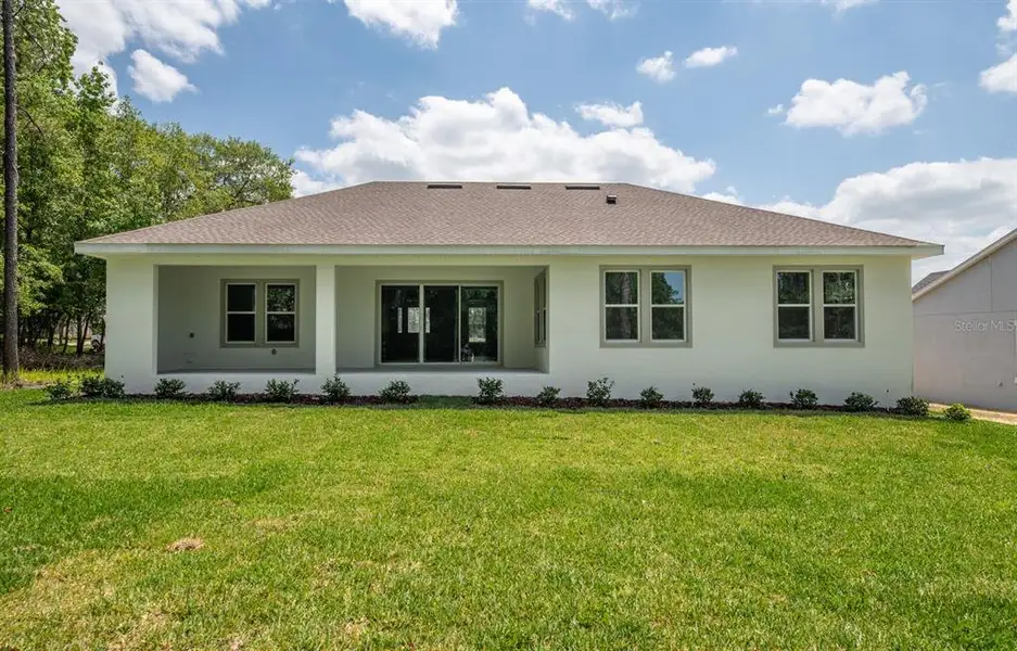 Exterior details and patio area of a home in , Ocala (Image 3).