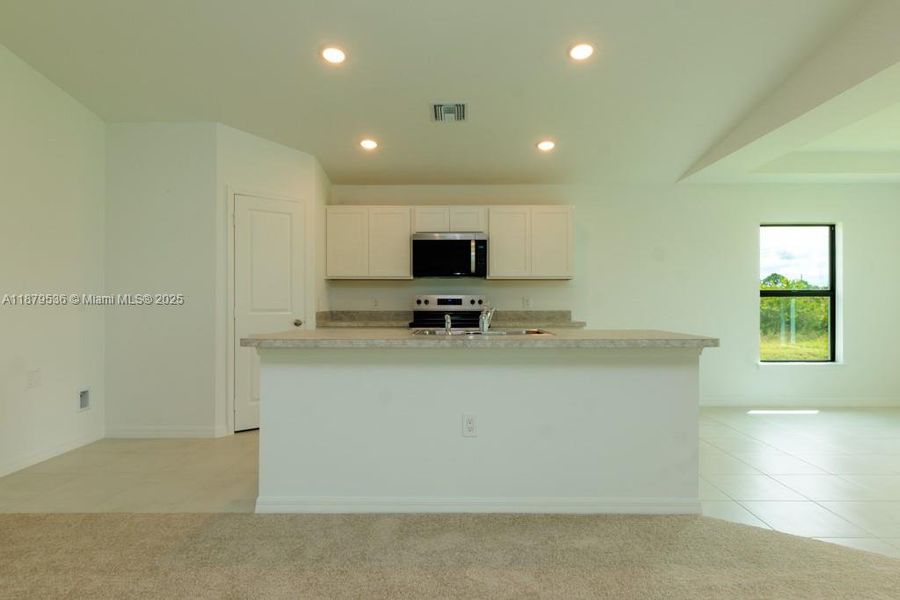 Furnished interior view inside a new home in , Lehigh Acres (Image 7). Furnished interior view inside a new home in , Lehigh Acres (Image 7).