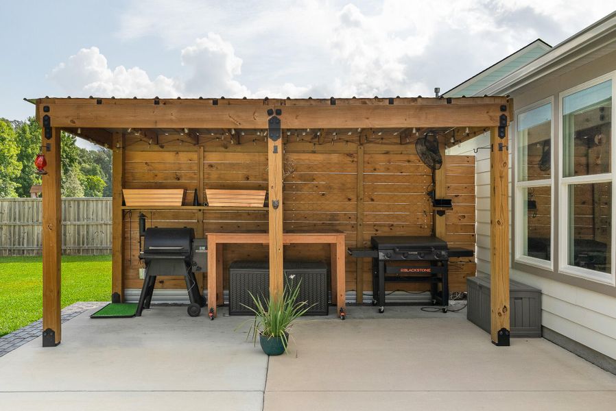 Exterior details and patio area of a home in Sea Island Preserve, Johns Island (Image 23).