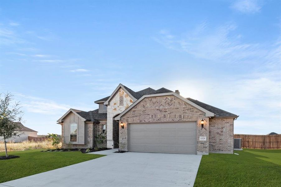 Front exterior of a new home in Bull Hide Estates, Hewitt, TX, highlighting curb appeal (Image 19).
