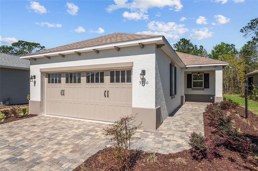 Front exterior of a new home in , Ocala, FL, highlighting curb appeal (Image 21).