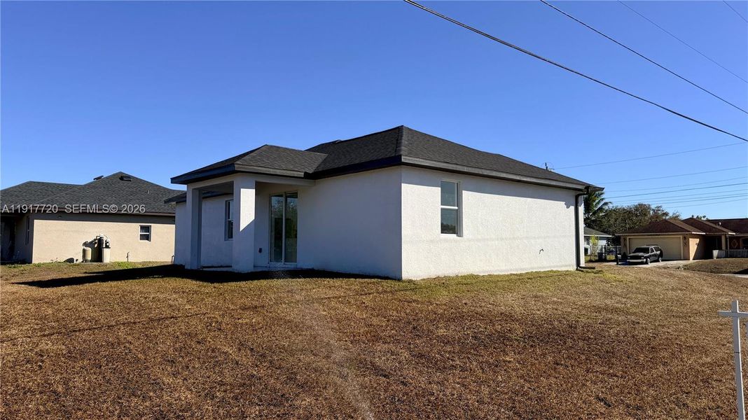 Exterior details and patio area of a home in , Lehigh Acres (Image 16).