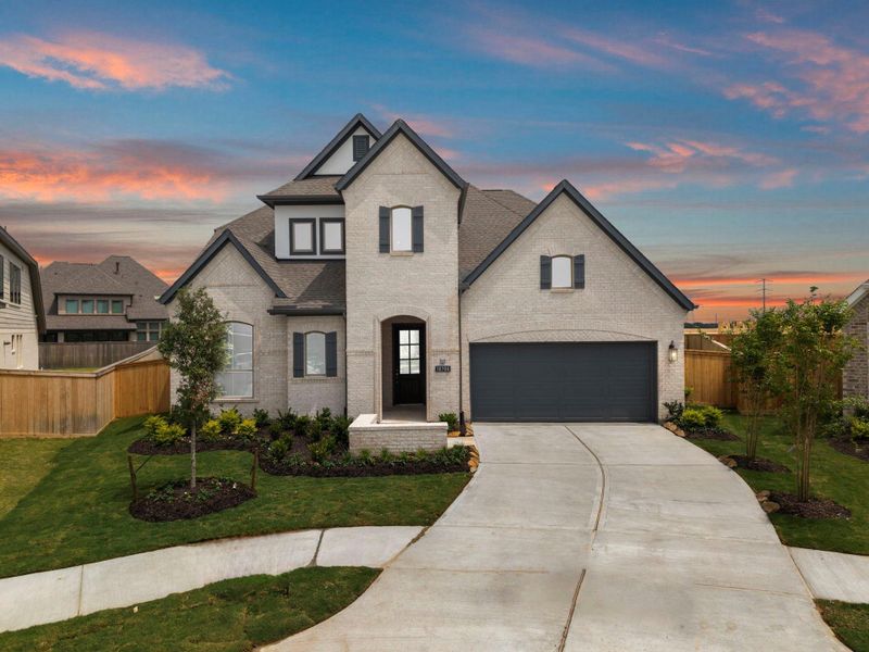 Front exterior of a new home in Bridgeland, Cypress, TX, highlighting curb appeal (Image 22).