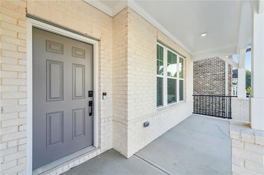 Exterior details and patio area of a home in Auburn Glen, Dacula (Image 25).