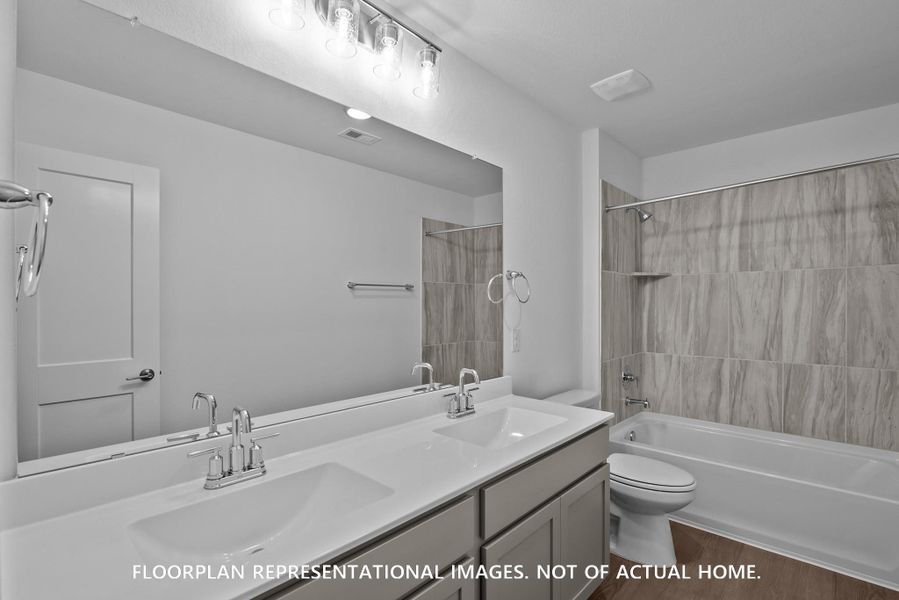 Furnished interior view inside a new home in Pinewood at Grand Texas, New Caney (Image 6).