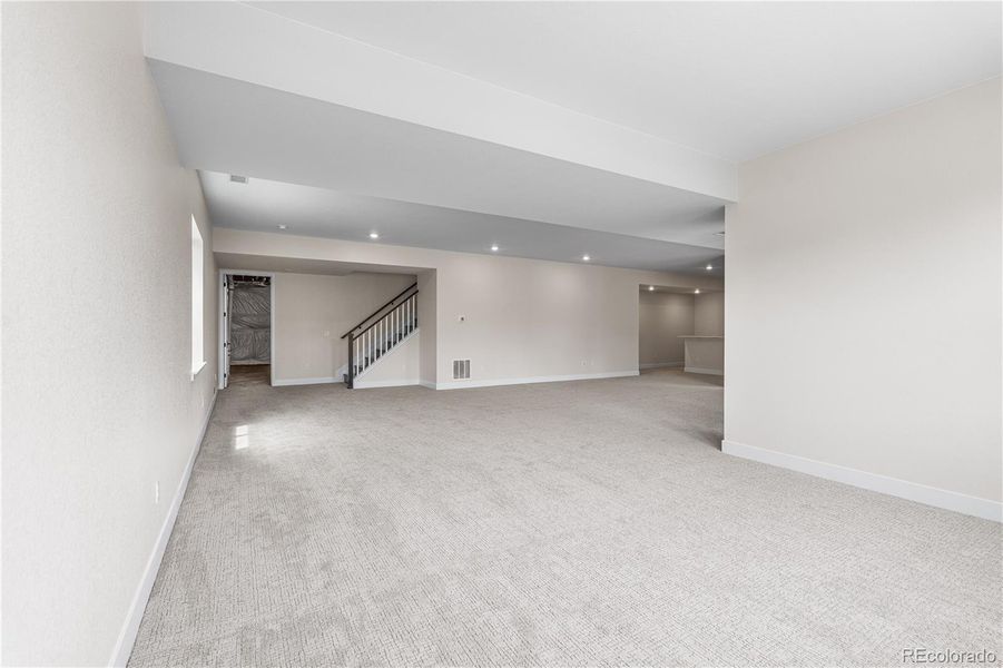 Spacious, unfurnished interior of a new home in Retreat at The Canyons, Castle Pines (Image 31).