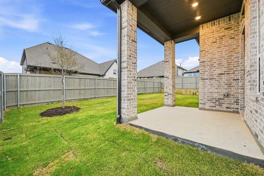 Exterior details and patio area of a home in Pecan Square: 50ft. lots, Northlake (Image 2).