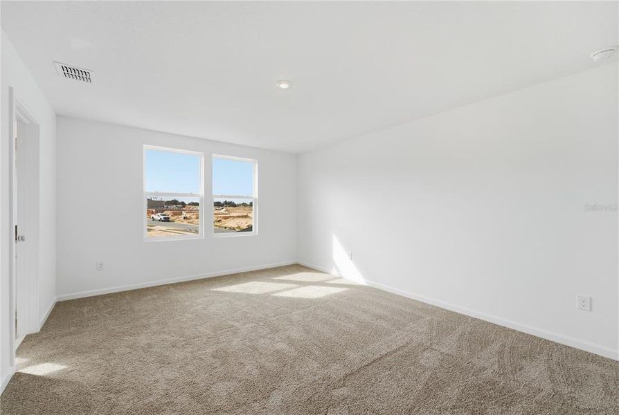 Spacious, unfurnished interior of a new home in Rainwood, Clermont (Image 25).