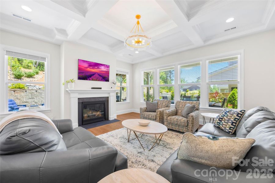 Living Room with Cofferred Ceiling and Fireplace Living Room with Cofferred Ceiling and Fireplace