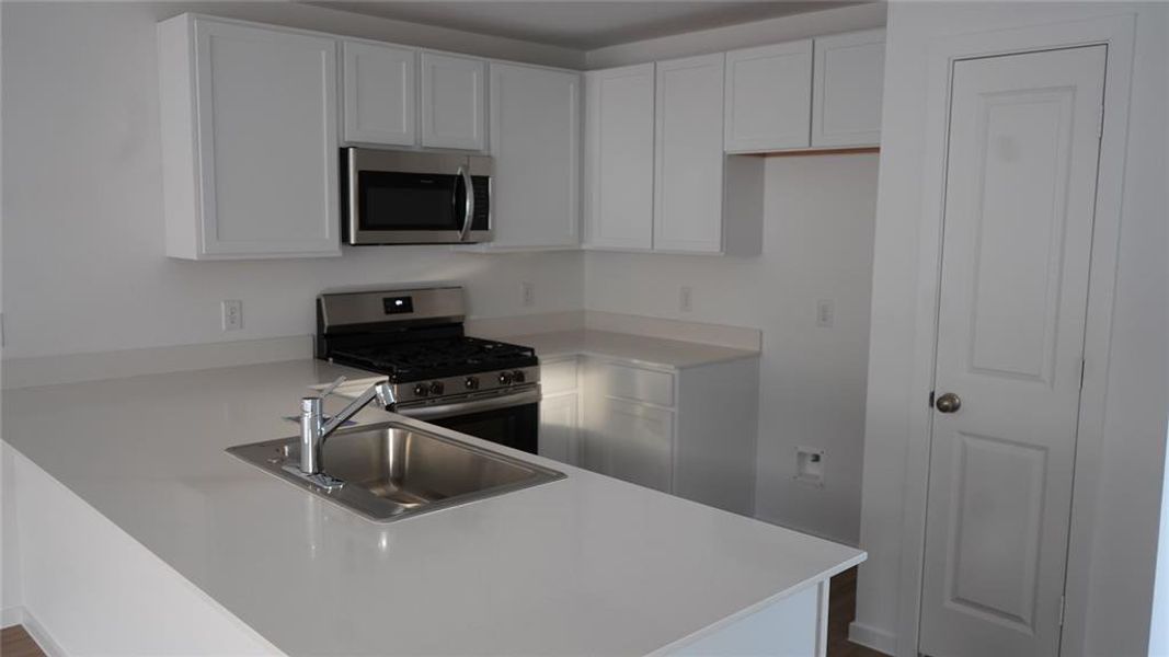 Furnished interior view inside a new home in Flagstone, Humble (Image 4).