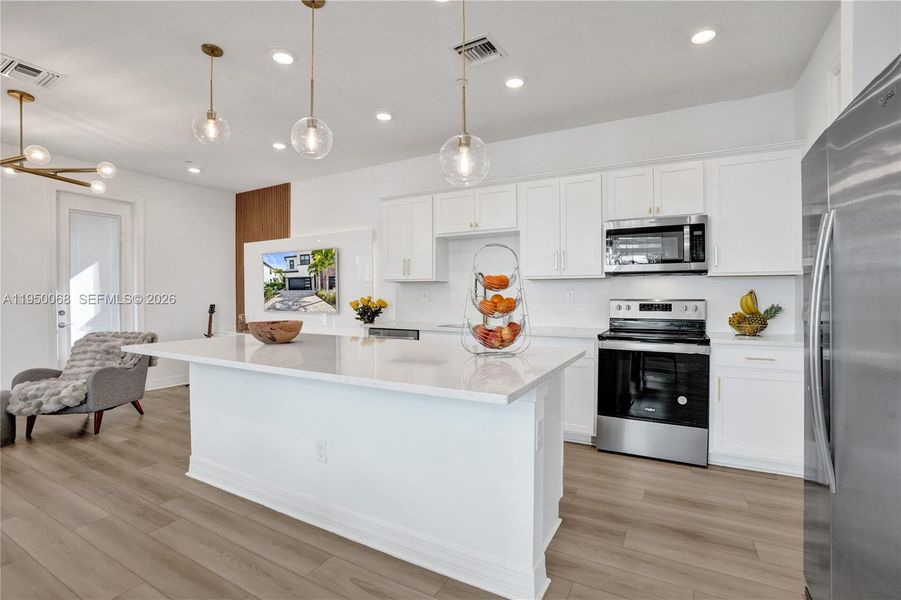 Furnished interior view inside a new home in , Plantation (Image 9).