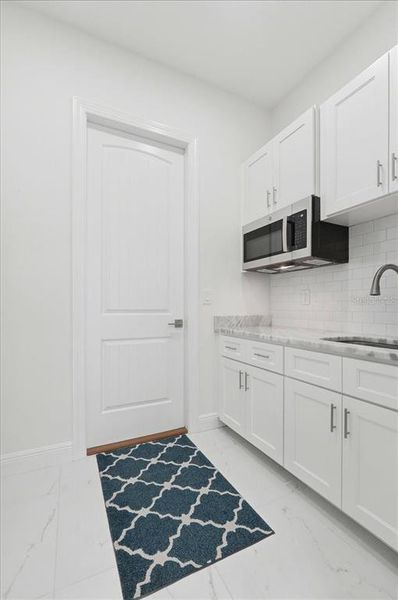 Furnished interior view inside a new home in , Polk City (Image 7).