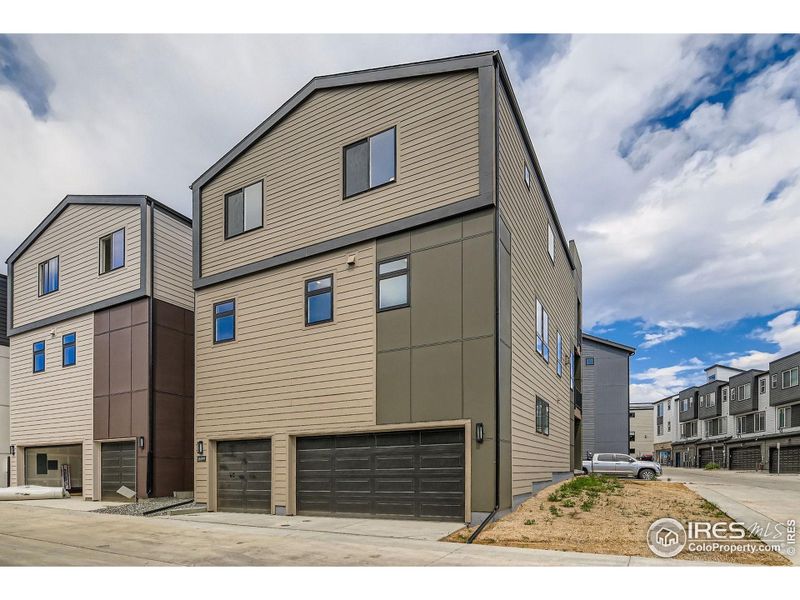 Front exterior of a new home in Baseline, Broomfield, CO, highlighting curb appeal (Image 25).