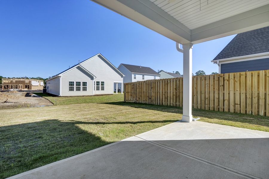 Exterior details and patio area of a home in Grand Park, Leland (Image 20).