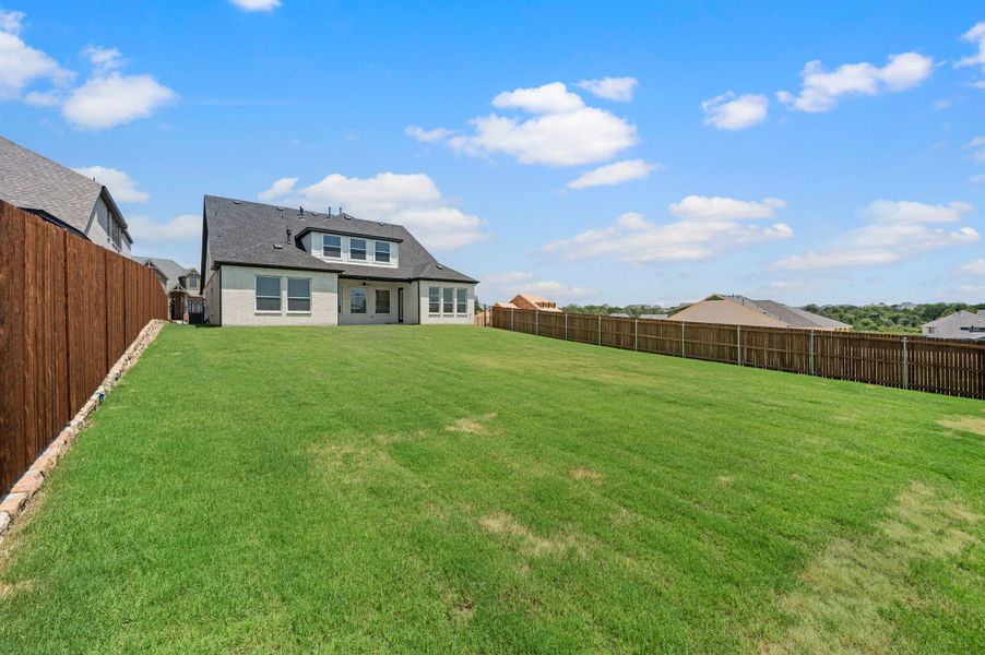 Exterior details and patio area of a home in Parks of Aledo, Aledo (Image 27).