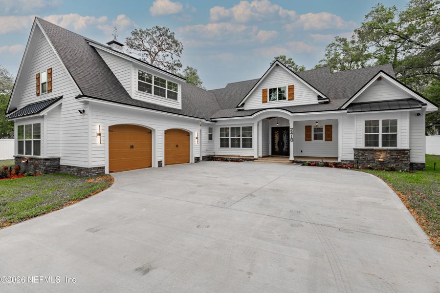 Front exterior of a new home in , Jacksonville, FL, highlighting curb appeal (Image 24).