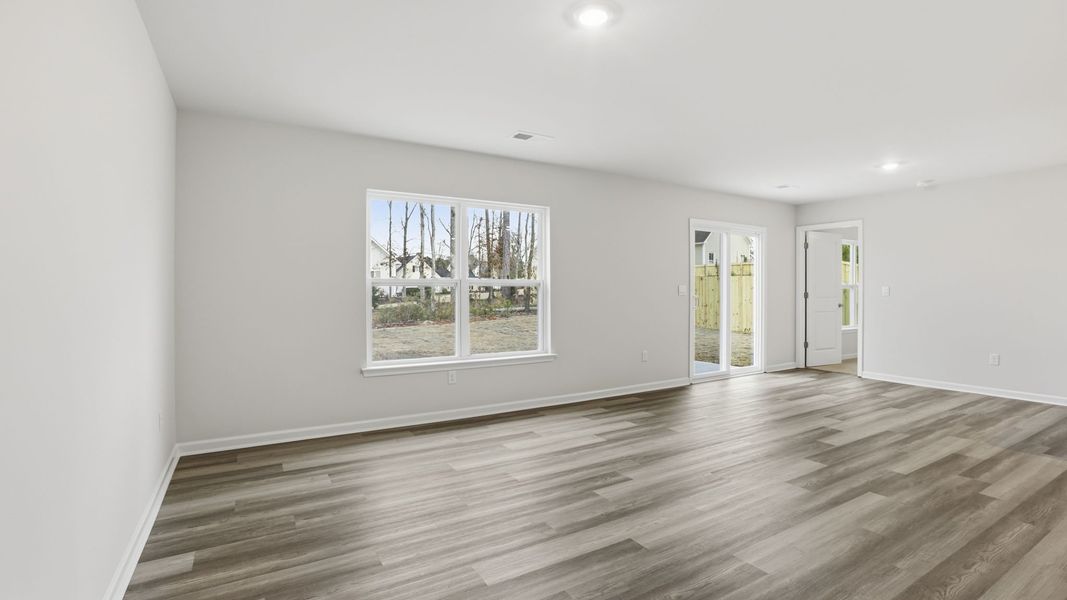 Spacious, unfurnished interior of a new home in Bentley Park, Greenwood (Image 21).