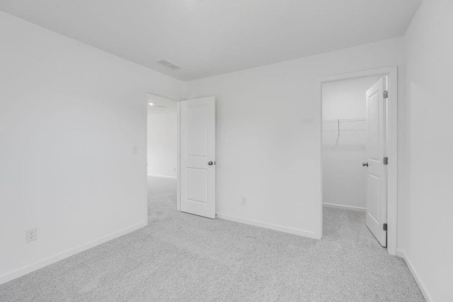 Spacious, unfurnished interior of a new home in Windance Lake, Loganville (Image 31).