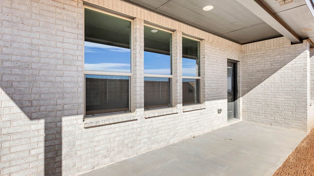 Exterior details and patio area of a home in Northwest Passage, Midland (Image 3). Exterior details and patio area of a home in Northwest Passage, Midland (Image 3).