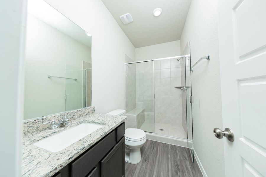 Furnished interior view inside a new home in Mackenzie Creek, Conroe (Image 4).