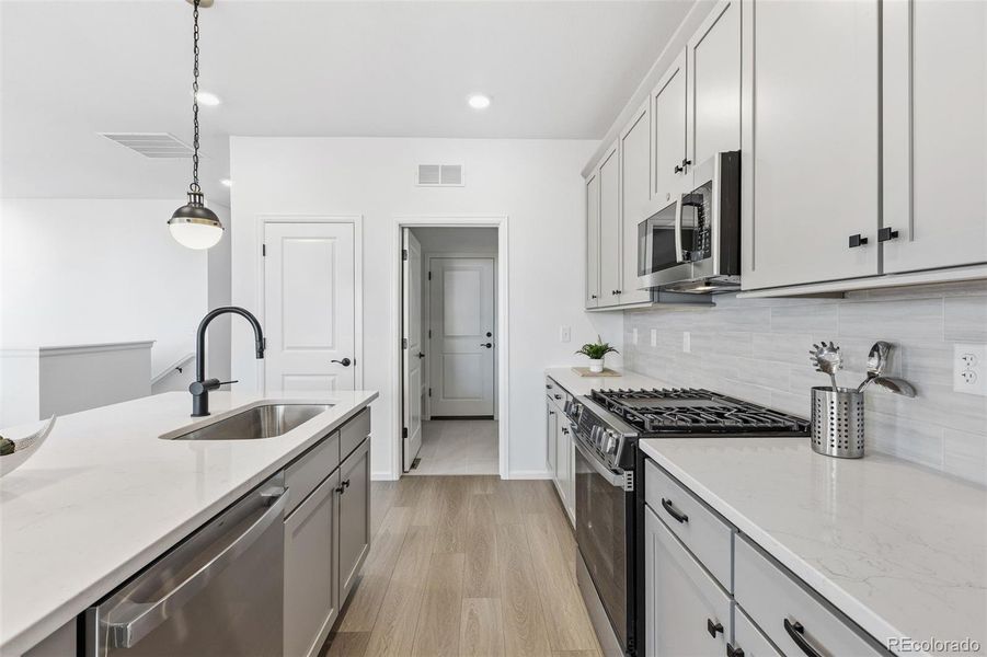 Furnished interior view inside a new home in The Cottages Collection at Ridgeline Vista, Brighton (Image 17).